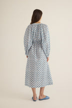 Back view of model wearing the Juliet Block Printed Cotton Drop Sleeve Raglan Shirt Dress in Blue Gardenia