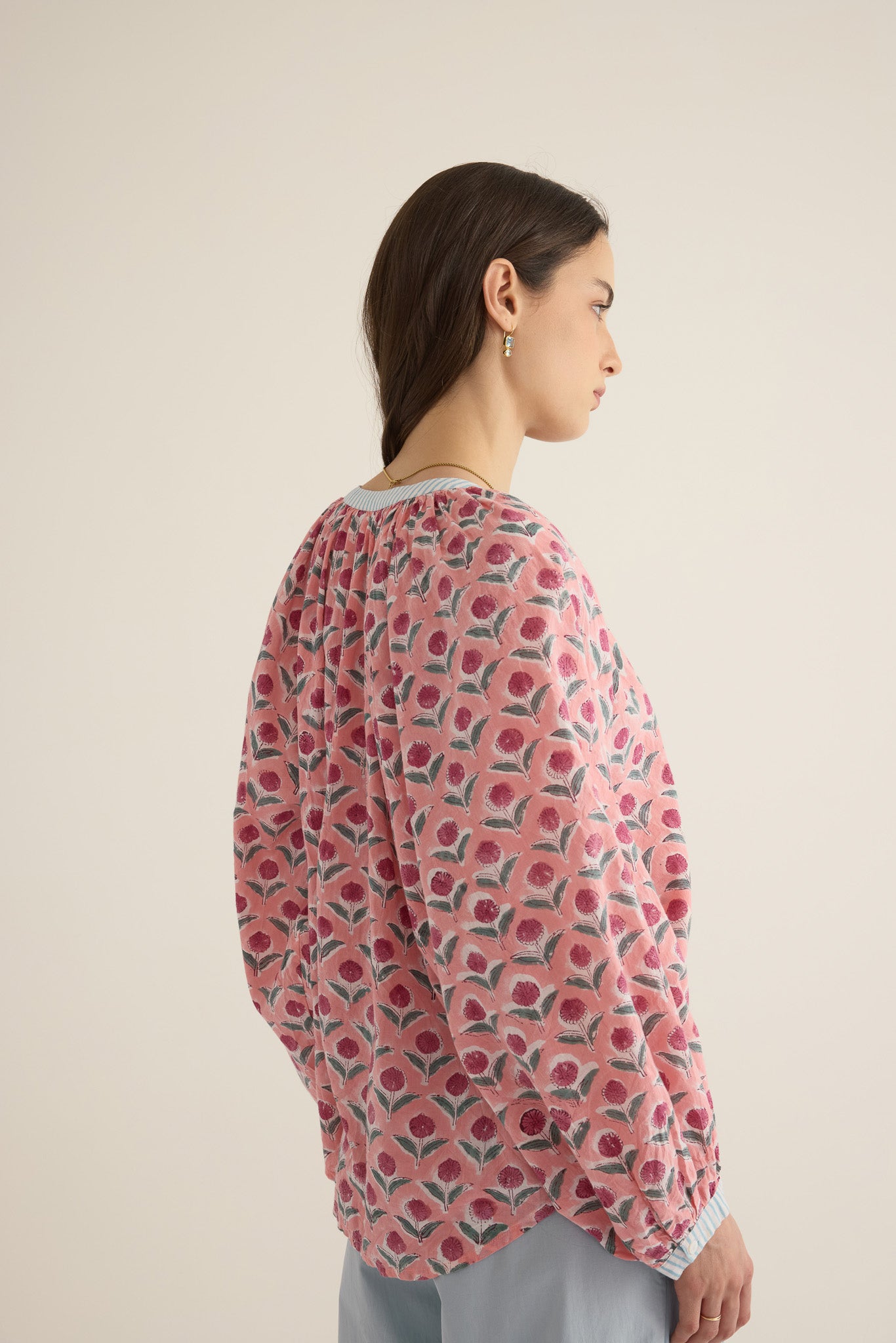 Back view of model wearing the Juliet Block Printed Cotton Drop Sleeve Raglan Shirt in Pink Dahlia