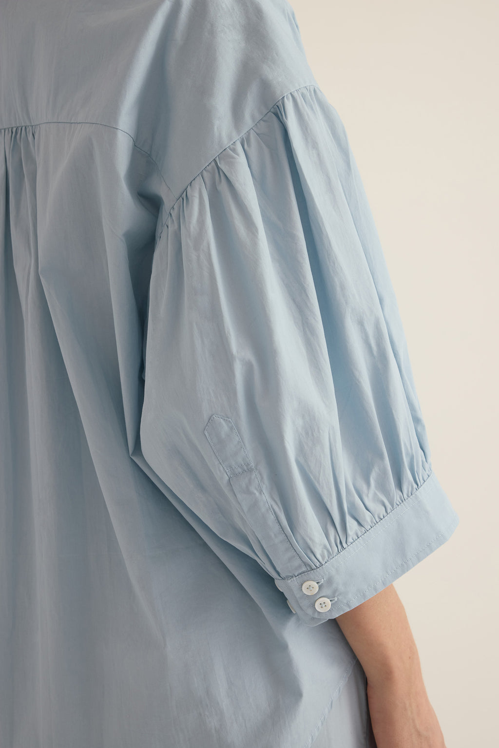 Close up of Romeo wide cuff shirt sleeve  in forget me not pale blue